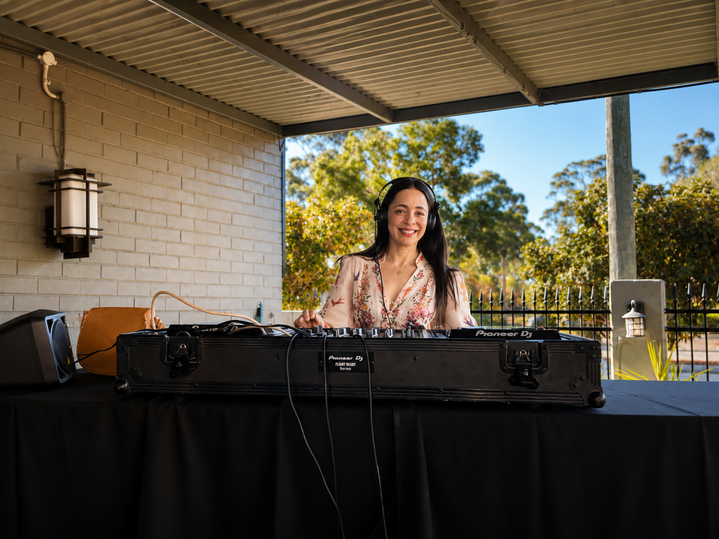 JoNisha performing an outdoor daytime set on Pioneer DJ equipment